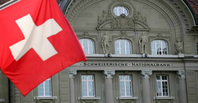 Swiss central bank shifts into wait-and-see mode