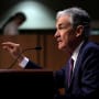 Fighting history: monetary policy and flattening yields